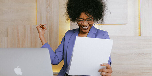 Do you have a sick leave policy Women being excited while reading letter