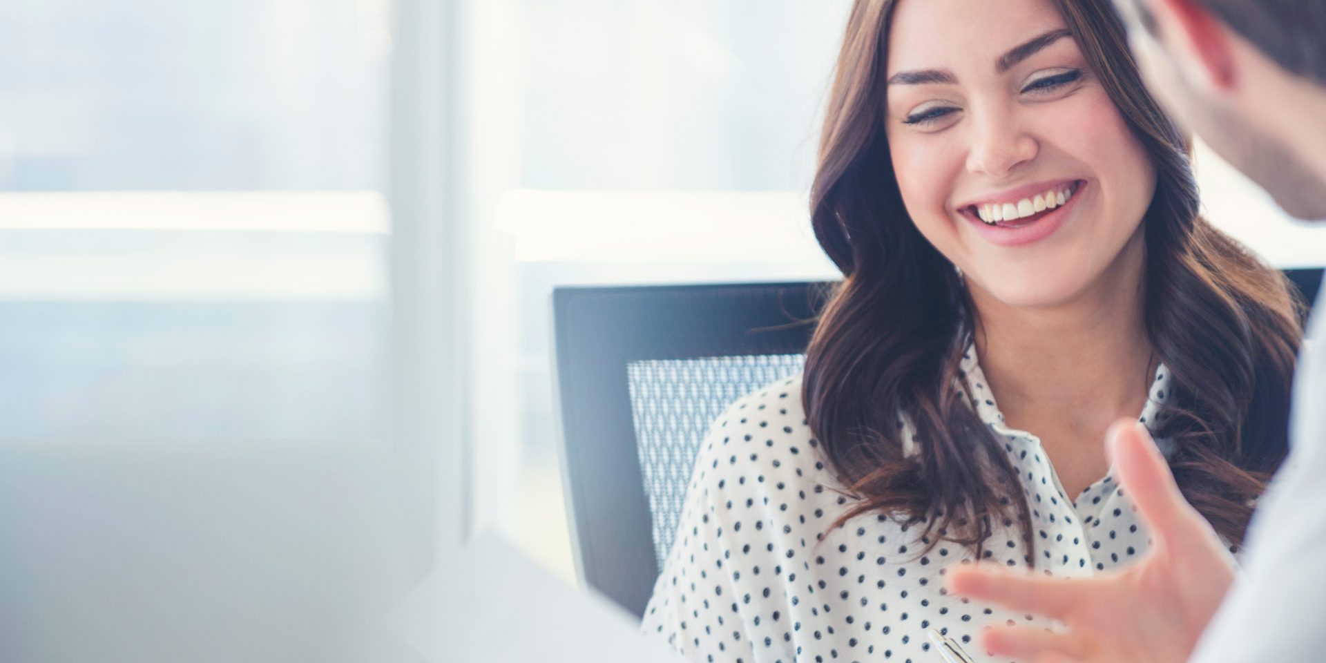 team members working together to go through paperwork