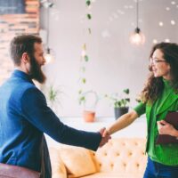 two people shaking hands