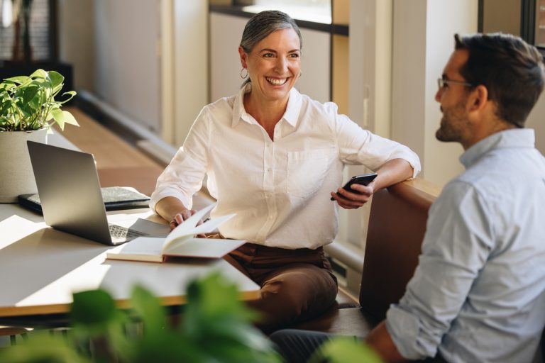 Senior businesswoman meeting with partner pr